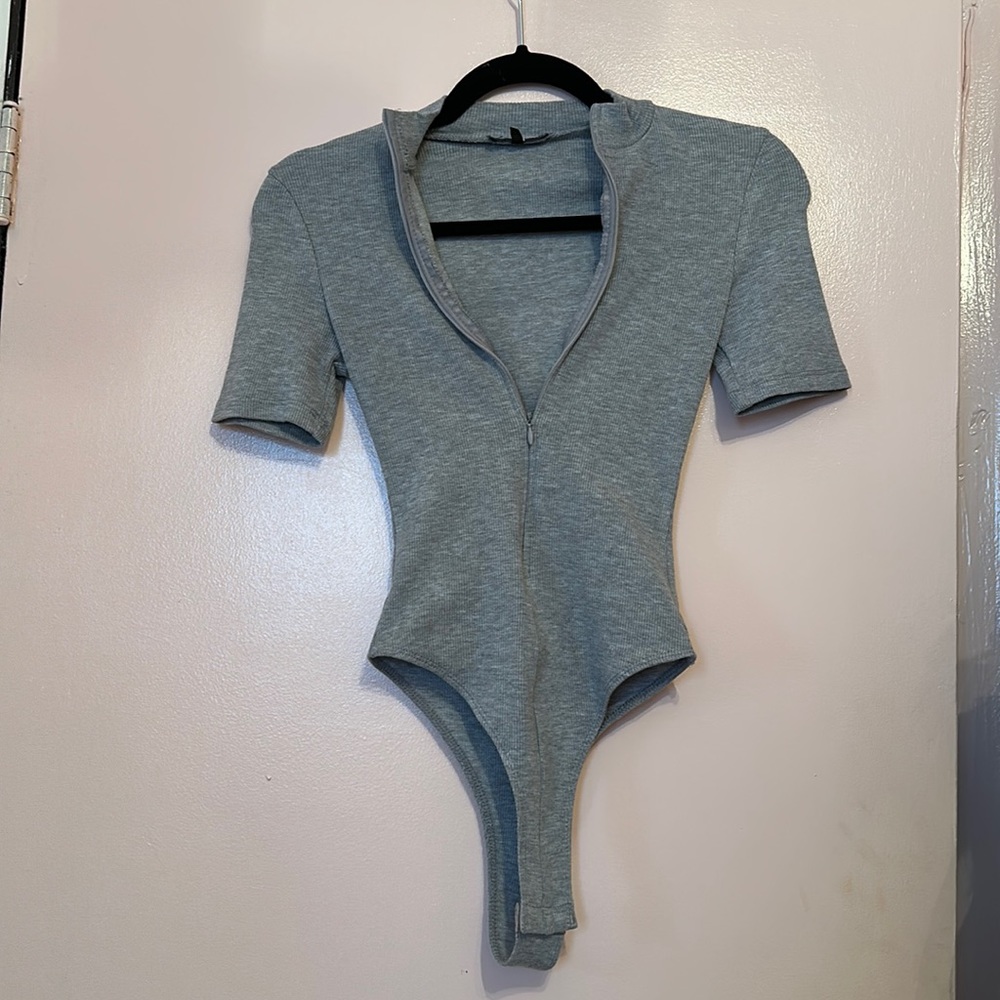 Zip front body suit